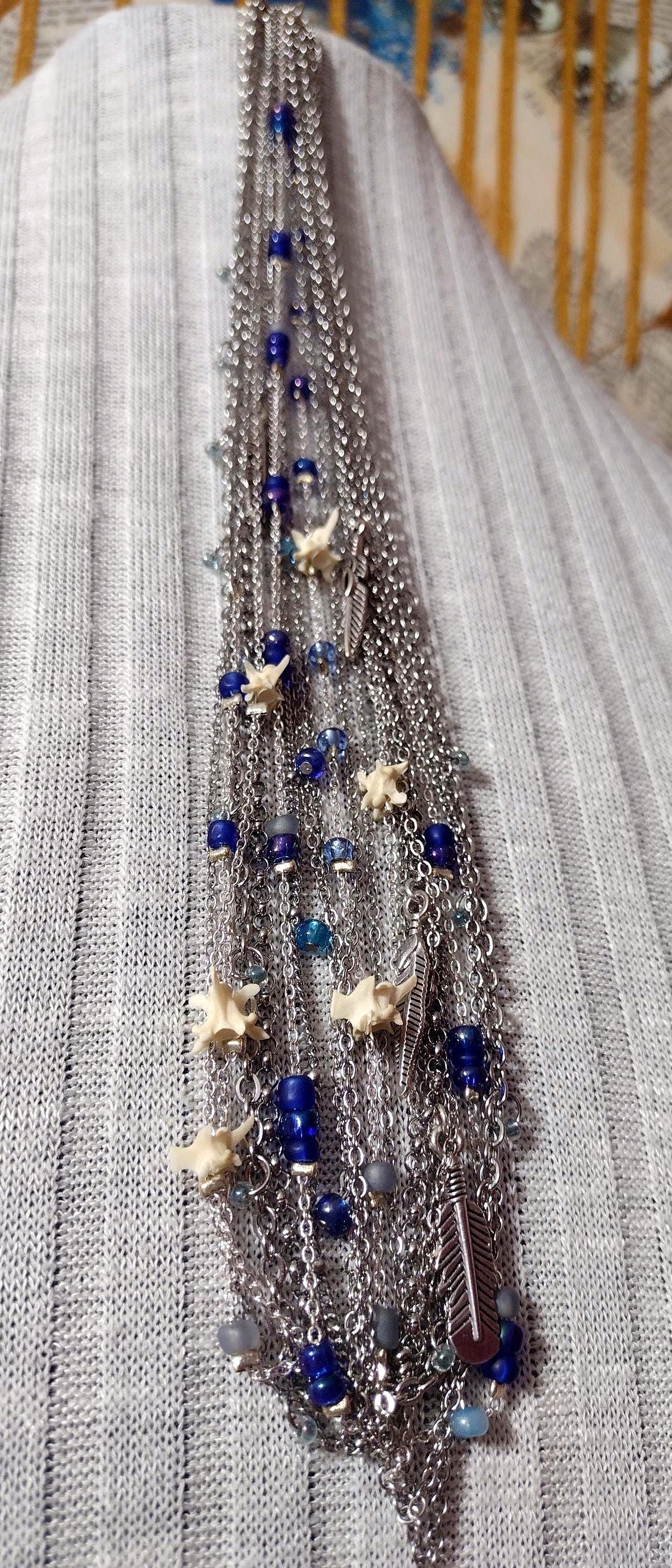 Native Southwest Stainless Steele Chain Necklace. Rattlesnake vertebra, cobalt glass, and silver feathers. New Mexico Crafted.