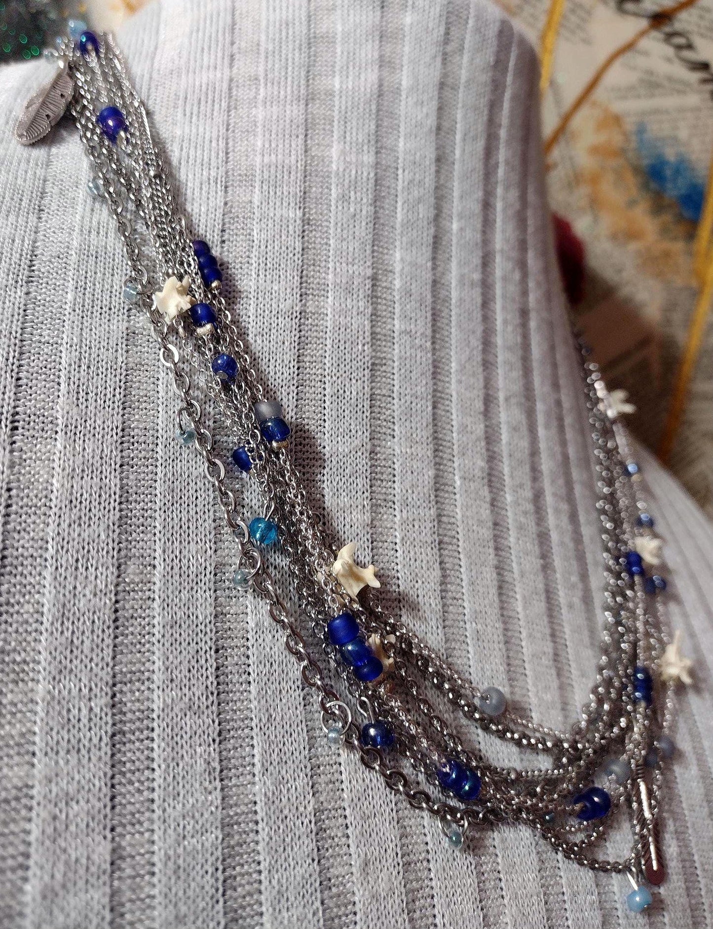 Native Southwest Stainless Steele Chain Necklace. Rattlesnake vertebra, cobalt glass, and silver feathers. New Mexico Crafted.