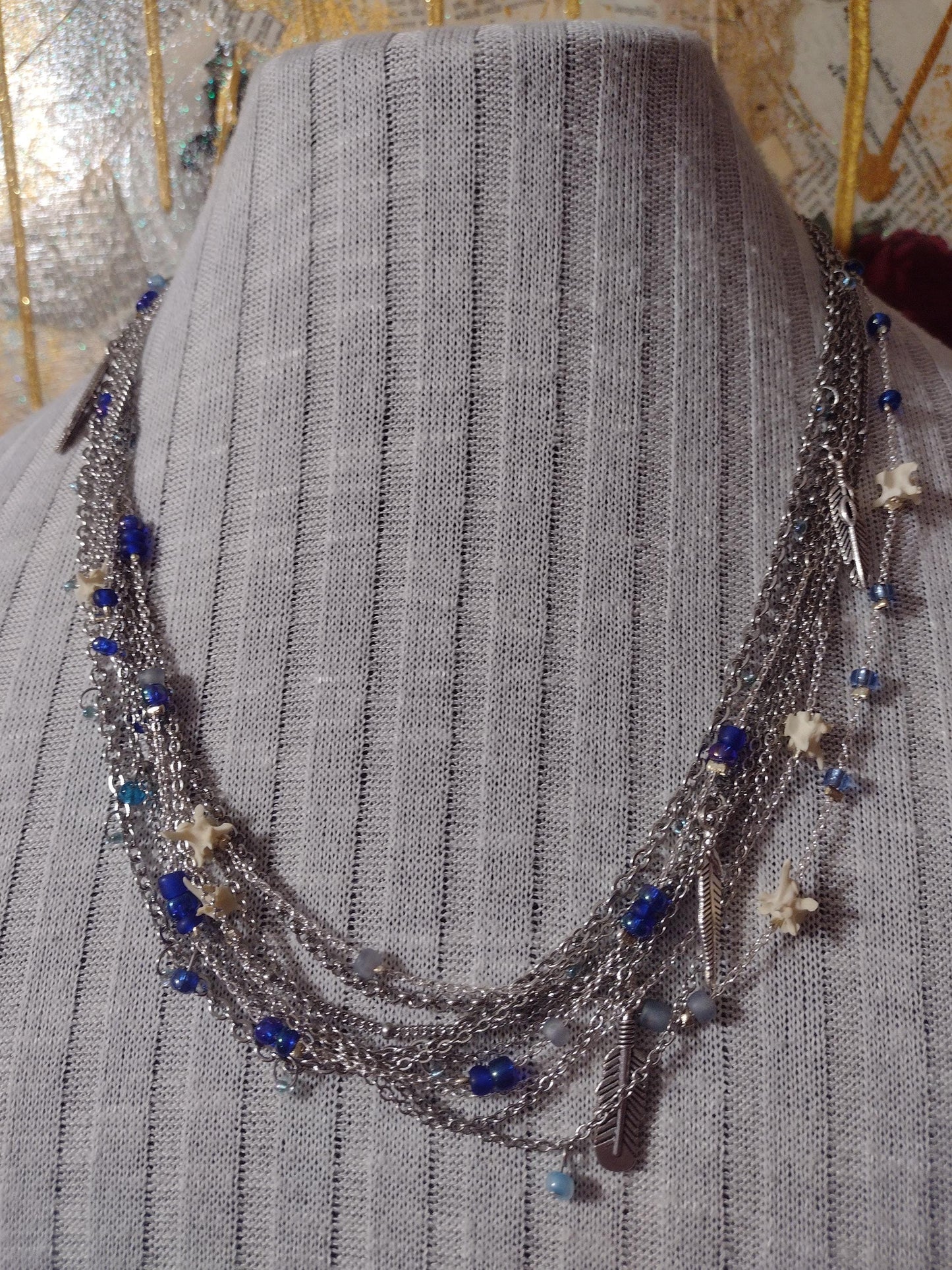 Native Southwest Stainless Steele Chain Necklace. Rattlesnake vertebra, cobalt glass, and silver feathers. New Mexico Crafted.