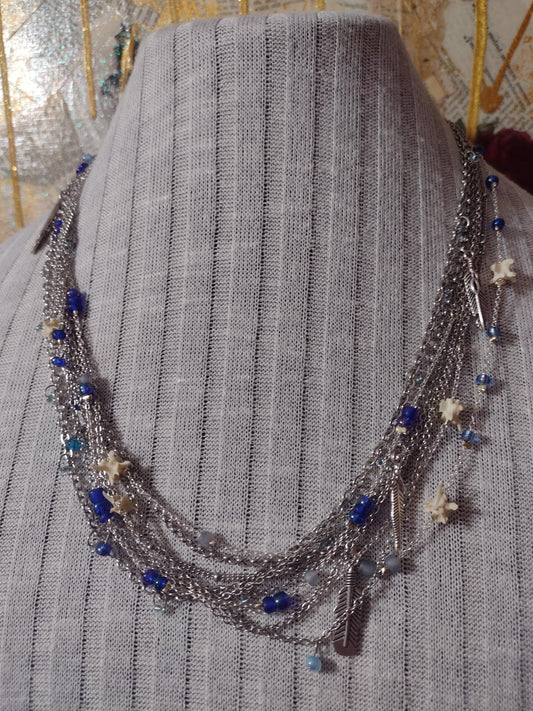 Native Southwest Stainless Steele Chain Necklace. Rattlesnake vertebra, cobalt glass, and silver feathers. New Mexico Crafted.