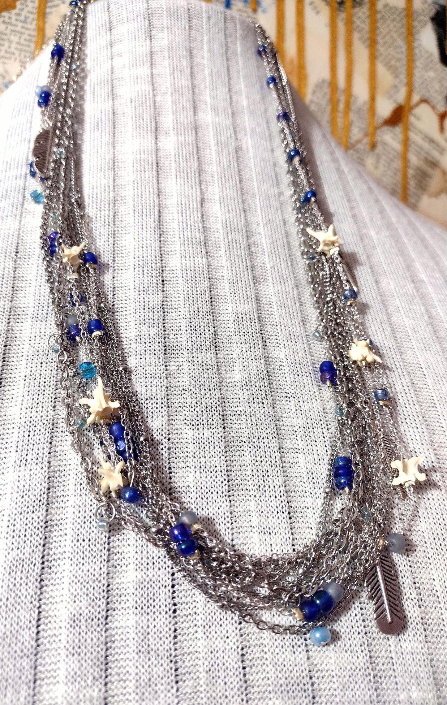 Native Southwest Stainless Steele Chain Necklace. Rattlesnake vertebra, cobalt glass, and silver feathers. New Mexico Crafted.
