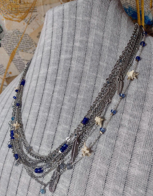Native Southwest Stainless Steele Chain Necklace. Rattlesnake vertebra, cobalt glass, and silver feathers. New Mexico Crafted.