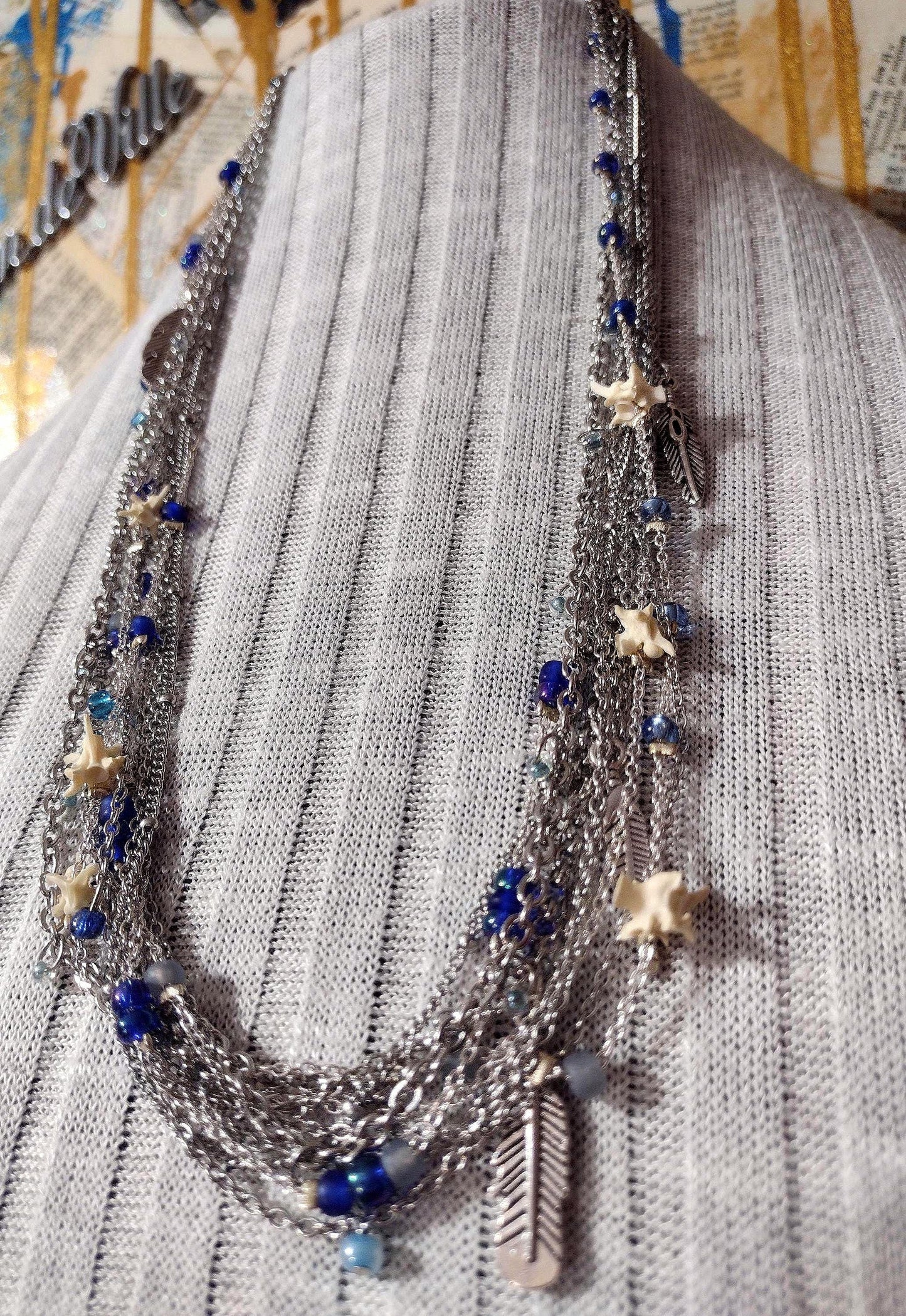 Native Southwest Stainless Steele Chain Necklace. Rattlesnake vertebra, cobalt glass, and silver feathers. New Mexico Crafted.